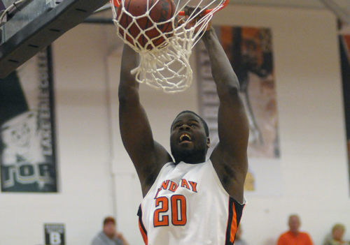 #24 Oilers Hold Off Cardinals, Win 64-56