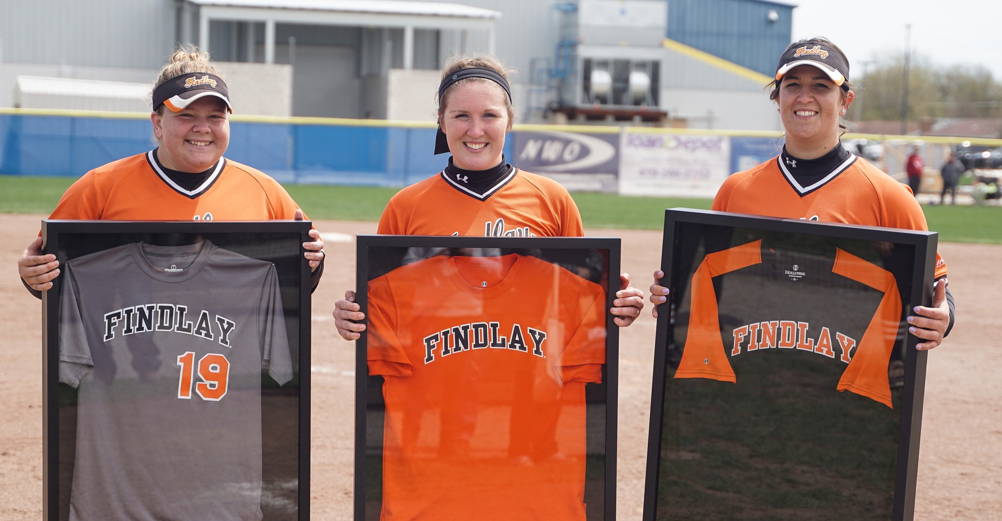 Salwa Al-Hajabed, Hailey Bryan, and Amanda DelMonte pose with their jerseys on Senior Day