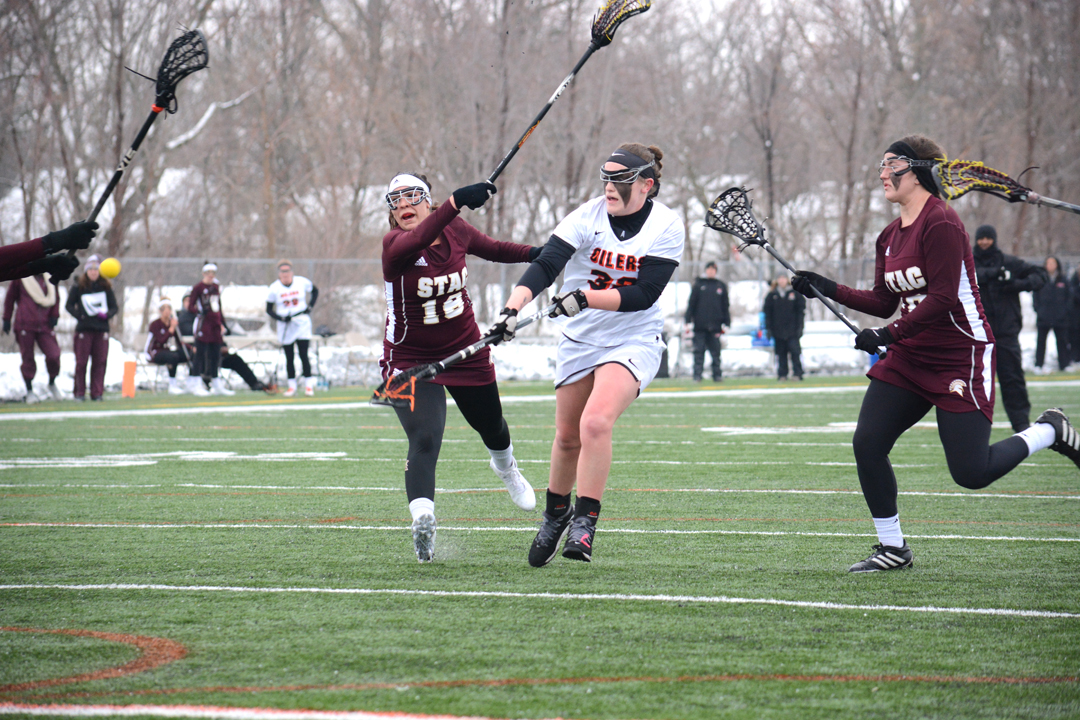 Oilers Win 9-7 in Snowy Game at Armstrong
